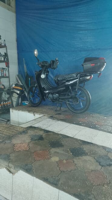 Motonəqliyyat: Skuter tipli motosiklet – şəhər içi sürüş və gündəlik istifadə üçün — 2