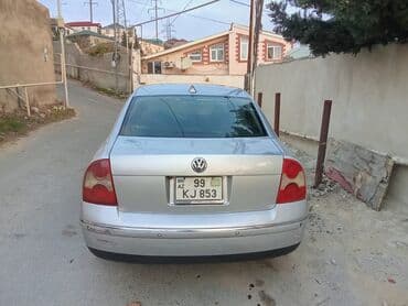 avtobus oturacaq: Volkswagen Passat: 1.8 l | 2003 il Sedan — 2