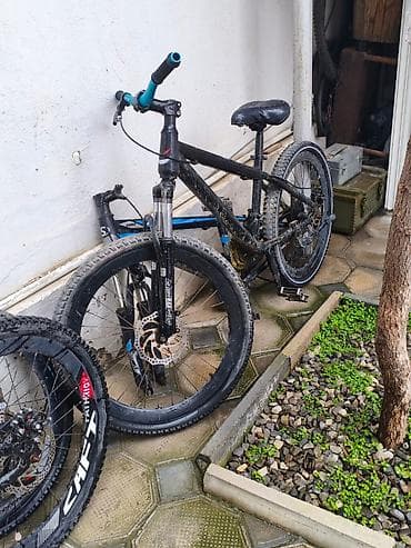 Velosipedlər: Dağ velosipedi – sərt çərçivə, amortizatorlu ön çəngəl və disk əyləclə — 2