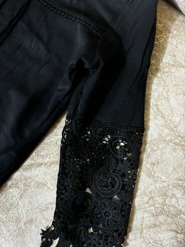 Çimərlik geyimləri: Qara bluz – ölçü S - Model: Uzunqol, yaxası iplə bağlanan/tasselli - — 2