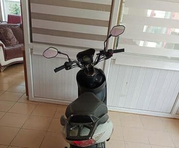 gence traktor zavodu yeni qiymetleri: Skuter – Aerox Ares model - Rəng: boz-gümüşü gövdə, qara üst panel — 7