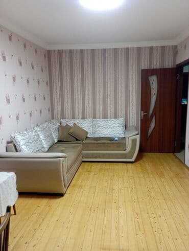 Гаражи: Mənzil – 2 otaqlı, tam mebellidir. - Geniş zal: künc divan, TV stendi — 2