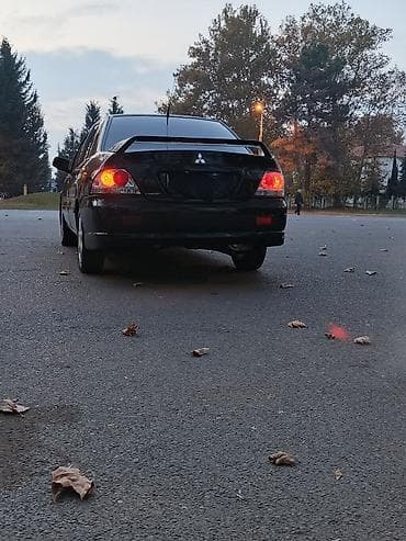hyundai elantra teker: Mitsubishi Lancer: 1.6 l | 2005 il 290000 km Sedan — 5