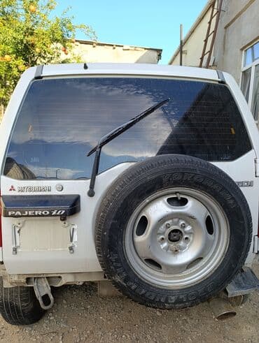 запчасти на паджеро 2: Mitsubishi Pajero IO – ağ rəngli, 5 qapılı kompakt SUV Xüsusiyyətlər — 4