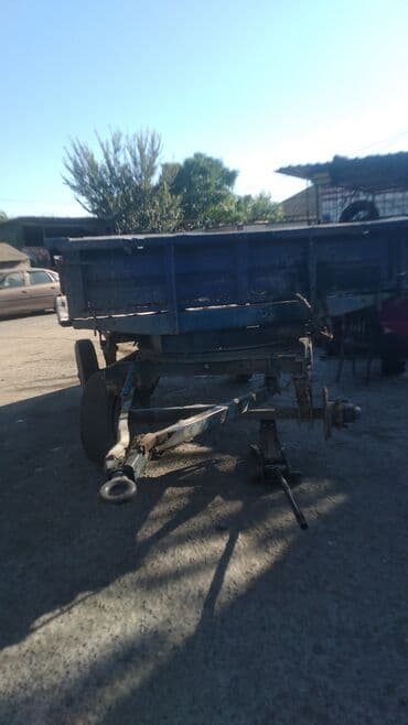 Kənd təsərrüfatı qoşqusu – 2 oxlu, üçtərəfli bortlu metal kuzov