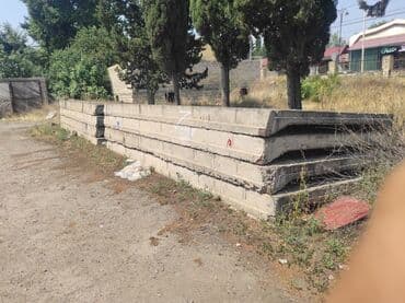 divar izolyasiya materialları: Düzbucaqlı formada, boz rəngli dəmir-beton plitələr. Plitələrin — 1