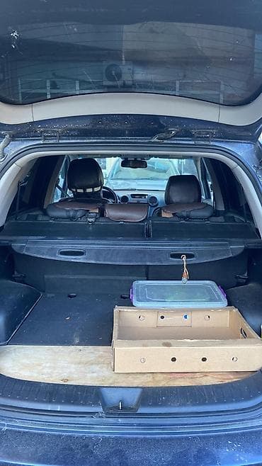 Aksesuarlar və tüninq: Kia Carens CRDi – dizel, avtomat - Kuzov: tünd mavi, 5 qapı — 5