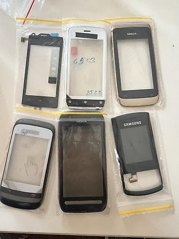 Vintage mobil telefon hissələri – qarışıq dəst Məzmun: - Sensor ön