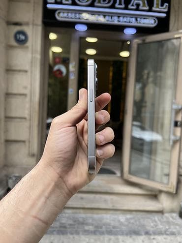 iphone dubay qiymetleri: IPhone 15 Pro, 256 GB, Natural Titanium, Zəmanət, Simsiz şarj, Face ID — 7