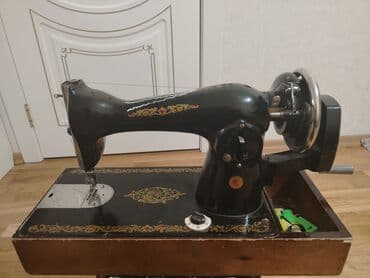 buğda üyüdən aparat: Mexanik tikiş maşını – klassik metal gövdəli model, Yalnız ünvandan — 2