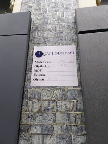 ev üçün qapı: Bu, MDF materialından hazırlanmış, tünd boz rəngli qapıdır. Müasir — 2