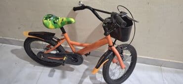 3 yaşdan yuxarı uşaqlar üçün velosipedlər: Bu, narıncı rəngli uşaq velosipedidir. Ön tərəfində əşyaları daşımaq — 3