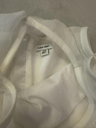 yasil don: Orginal Calvin Klein 10-11yaw 100$Dubaydan alinib 15azn satilir — 2