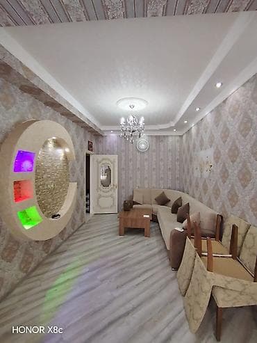 - İşıqlı və zövqlü şəkildə dizayn olunmuş zal otağı - Künc formasında