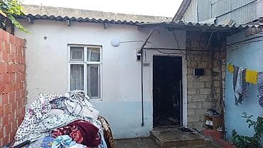 ivanovka ev: 3 otaqlı, 70 kv. m, Orta təmir — 2
