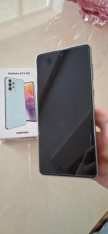 Мобильные телефоны и аксессуары: Samsung Galaxy A73 5G, 128 ГБ, цвет - Зеленый, Сенсорный, Отпечаток пальца, Две SIM карты — 1
