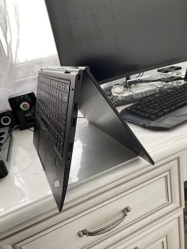 dinamik pioner: Lenovo ThinkPad Yoga seriyalı 2‑in‑1 noutbuk Xüsusiyyətlər: - 14" — 4