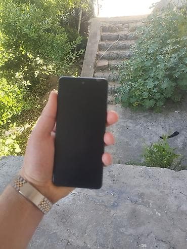 texno telefonlari: Oppo 5i, 128 GB, rəng - Bənövşəyi, Barmaq izi, Simsiz şarj, İki sim kartlı — 4
