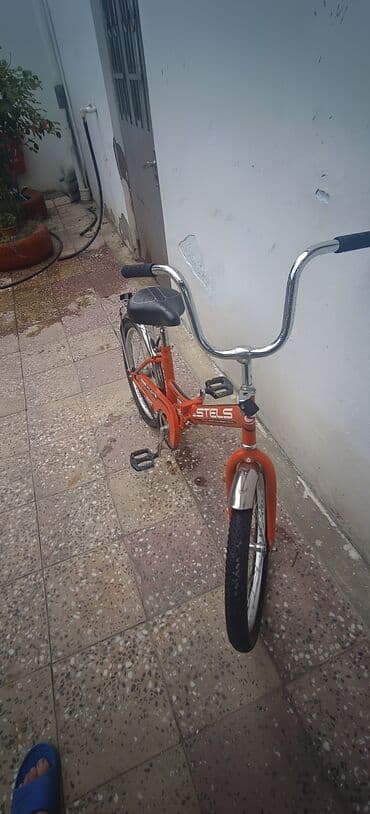 турники для дома купить: Stels markalı bu qatlanan velosiped narıncı rəngdədir və şəhər daxili — 3