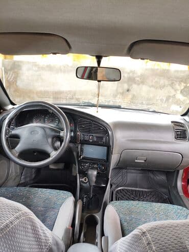 kia forte 2017: Kia Sephia: 1.6 l | 1998 il Sedan — 11