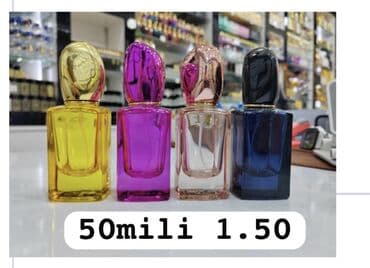 ağ mokasinlər: Rəngli, 50 ml həcmli ətirlər üçün şüşə qablar. Hər biri fərqli rəngdə — 1