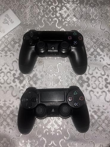PlayStation 4 DualShock a class. 4 gamepadları – 2 ədəd, qara rəng