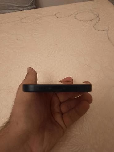 philips xenium e570: IPhone 15, Qara — 5