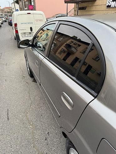 kia rio masin: Kia Rio: 1.4 l | 2010 il Sedan — 4