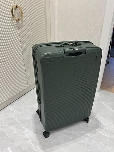 Böyük ölçülü səyahət çamadanı – tünd yaşıl rəngdə, sərt korpuslu