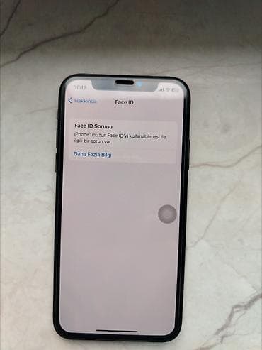 iphone x qiymeti 2 ci el: IPhone X, 64 GB, Black Titanium — 7