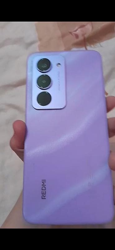 philips xenium 9@9h: Redmi smartfon – bənövşəyi rəngdə arxa qapaq, mat-parıltılı tekstura — 1