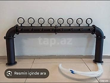 Оборудование для производства: Bu, səkkiz kranlı, qara rəngli metal içki dispenseridir. Dizaynı — 1