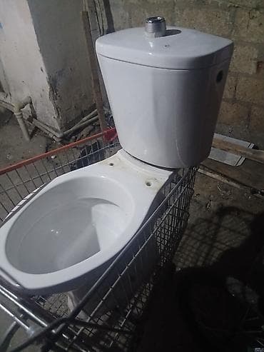 Sərfəli su sərfi olan kompakt unitaz-komplekt. - Korpus: ağ keramika lalafo.az -da Sərfəli su sərfi olan kompakt unitaz-komplekt. - Korpus: ağ keramika