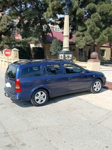 nissan oluxana baksol: Opel Astra: 2 l | 1999 il 600000 km Universal — 7