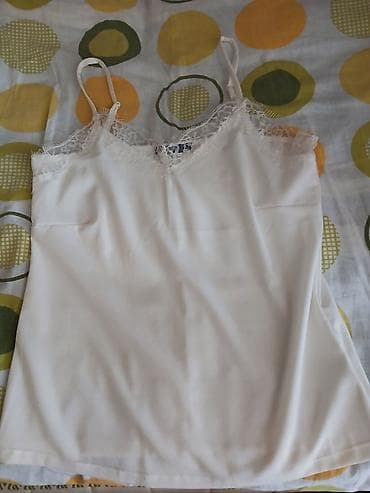 koftalar: 2 eded dantelli qolsuz kofta. Elaqe: 050 671 75 66 — 1