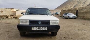 masin sekilleri rengleme: Tofaş doğan sedan - Korpus: ağ rəng, 4 qapı, klassik kvadrat dizayn - — 4