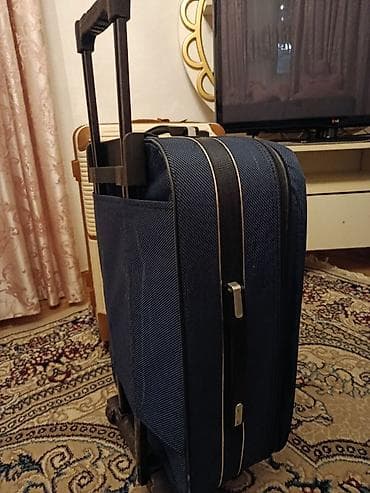 islenmis camadan: Təkərli əl yükü/orta ölçülü tekstil çamadan Uzunluq 60 sm En 40 sm — 2