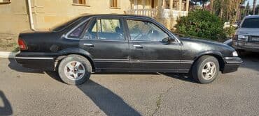 qadınlar ucun maşınlar: Daewoo LeMans sedan - Kuzov: 4 qapılı sedan, qara rəng - Nömrə — 3