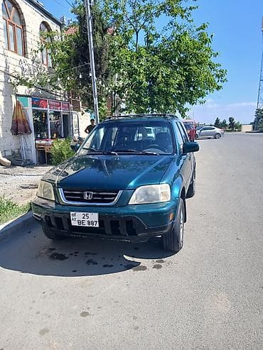baqaj: Honda CR‑V (1-ci nəsil) – yaşıl rəngli, 5 qapılı, şəhər və yüngül — 8