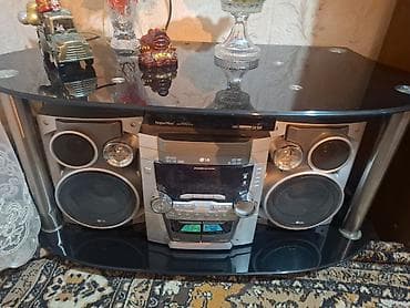LG musiqi mərkəzi . televizor altligi ile birge 50man. unvan keşlə