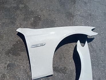 kuzu: Məhsul: Avtomobil üçün ön qanad cütü - Rəng: Ağ - Material: Metal - — 2