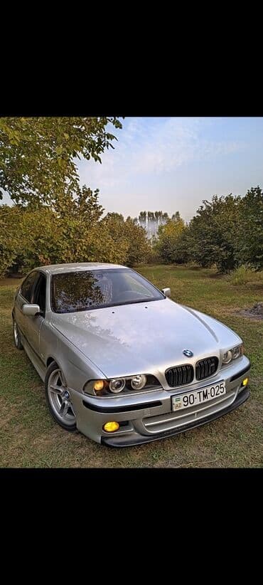 Yağlar və avtokimyəvi maddələr: BMW 5 Series E39 sedan – gümüşü rəngdə, M paketli görünüş.Mator — 5