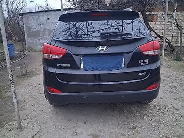 запчасти opel omega b: Hyundai ix35 – qara rəngli, şəhər və uzun yol üçün rahat krossover — 5