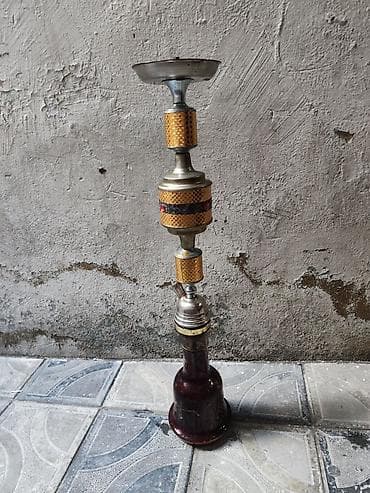 buta formasinda xonca: Misir Nərgilə üstündə yarım qab yağ tütün hediye (şüşə kolba + metal — 1