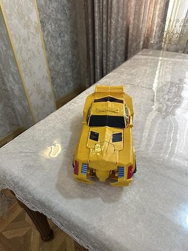Sarı rəngli transformasiya olunan oyuncaqlar maşın/robot - 2-si 1-də