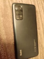 İnformatika: Xiaomi Redmi smartfon - Arxa paneldə “Redmi” loqosu və çoxmodullu — 2