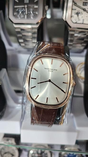 qol saati: Patek Philippe (Geneve) klassik kişi saatı - Korpus: yumru-kvadrat — 9