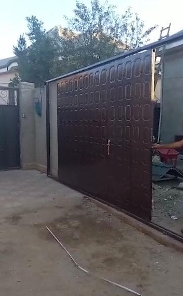 matolar: Reis üzərində yürüyən qapılar, mühərrik bir ton iki yüz klq, 1200 klq — 5