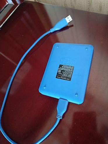 asus notebook adapter: 2 TB Hardd Disk. Western Digital (WD) brendinə məxsus xarici sərt — 2