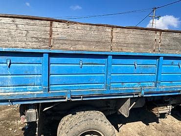 vaz oka satilir: Məhsul: Yük maşını – mavi rəngli, yanları taxta uzadılmış üçtərəfli — 4